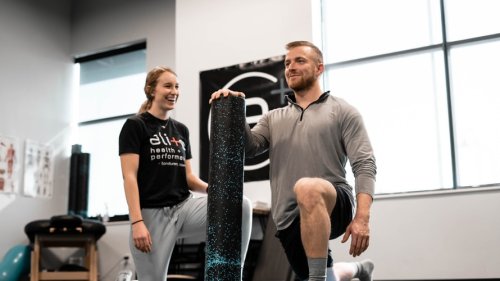 Athlete working with trainer for sports medicine - Tulane School of Professional Advancement
