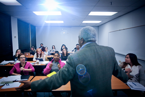 Professor teaching Emergency Management students in class - Tulane School of Professional Advancement