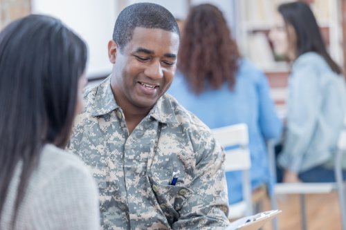 Plan for the next chapter of your life A make veteran talking to a woman representing tips for student veterans by Tulane School of Professional Advancement in New Orleans, LA