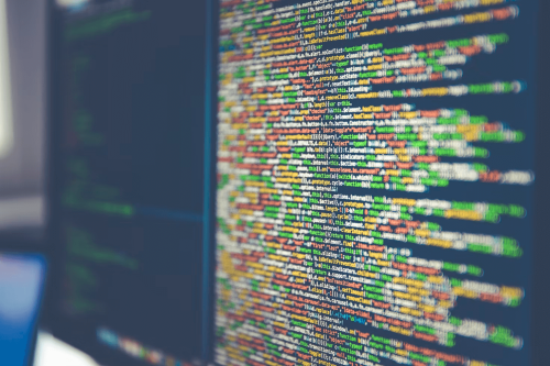 Code on a web developer's computer monitor - Tulane School of Professional Advancement