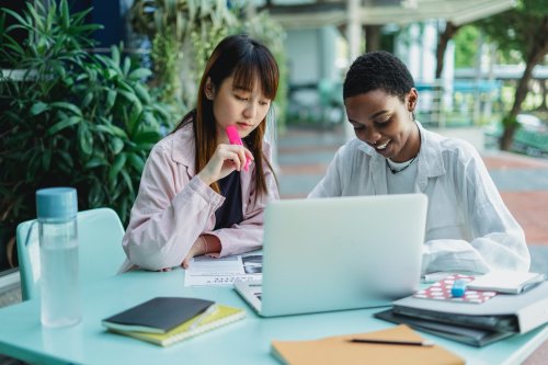 Find out if your minor matters Two students working together at a table