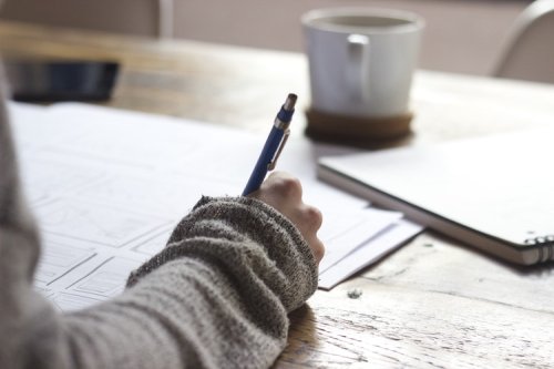 Prepare for your final exams A student taking notes