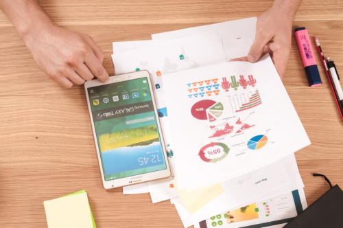 Read our tips for visualizing demographic data A person looking at charts and graphs