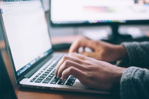 Give your LinkedIn profile a boost A person typing on a laptop