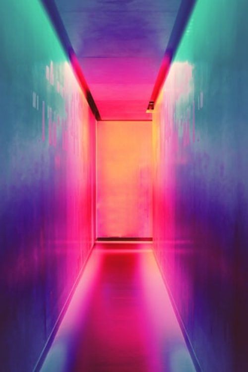 A colorfully-lit hallway