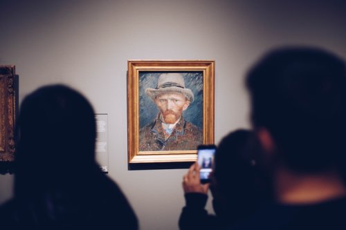 Find out more about what museum curators do People in an art museum