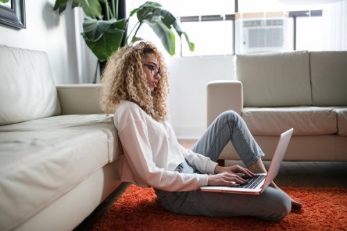 Ace your resume and cover letters A woman typing on her laptop