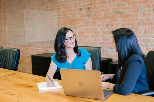 Learn more about exciting career opportunities in PR Two woman talking in a conference room
