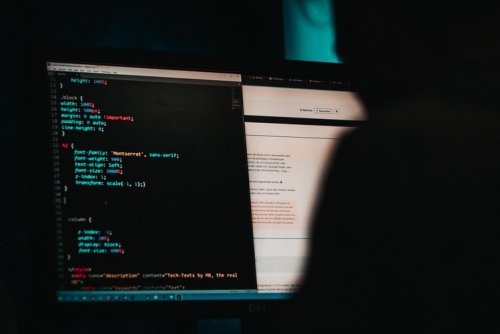 Learn more about the latest famous data breaches Code being displayed on a computer