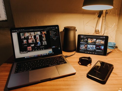 Master studying from home An at-home workspace with a laptop during a video call
