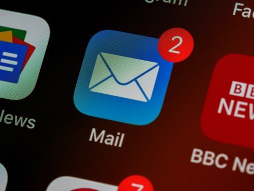 Learn to detect phishing threats A Mail app on a smartphone screen