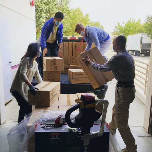 Develop as a leader in nonprofit management Nonprofit workers loading up a truck