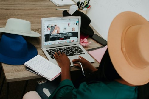 Learn about legal considerations of starting a small business A person on a laptop