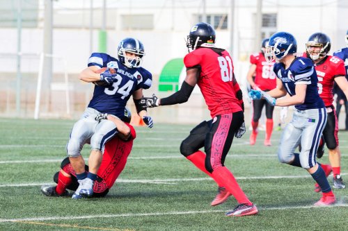 Two teams playing football