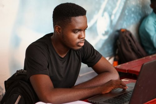 A student working on a laptop