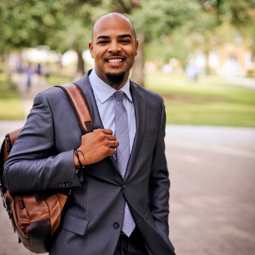 male student wearing a suit