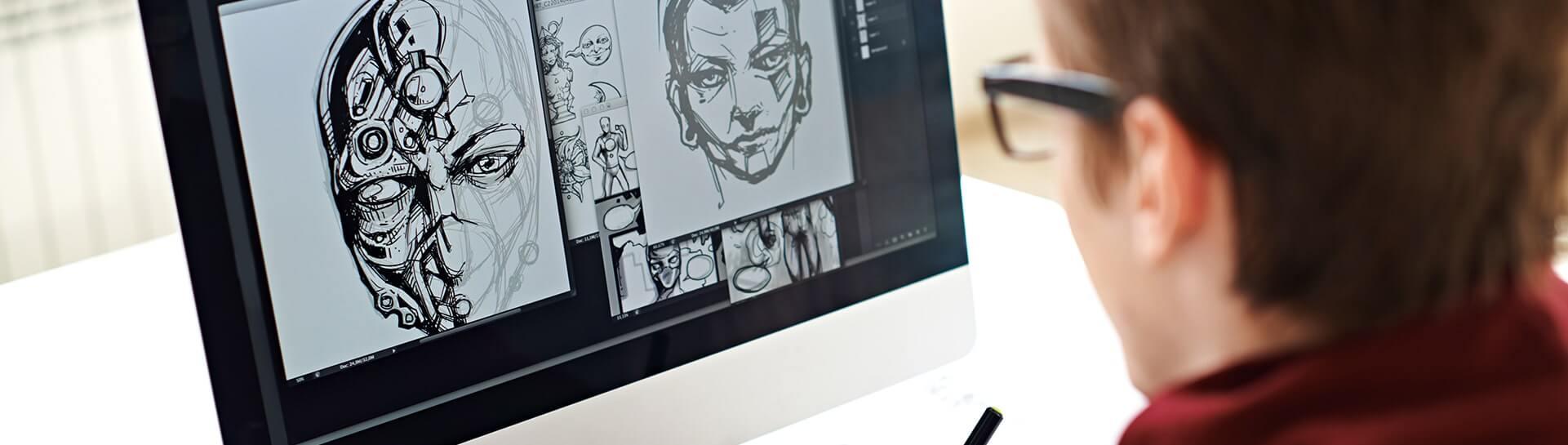 A man designing characters on a computer