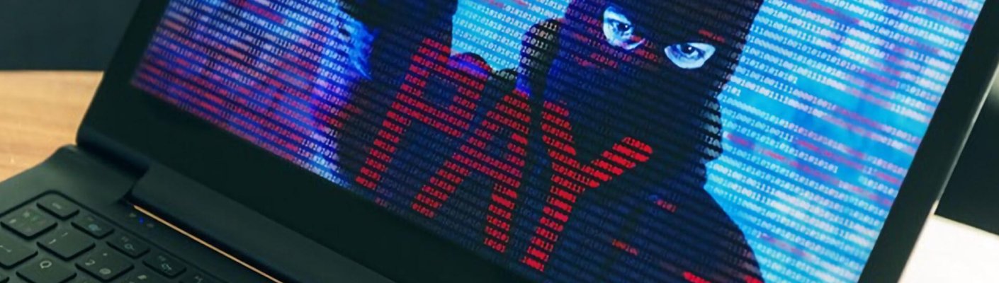 A computer screen showing a man in a mask representing ransomware remedies learned by students of the Tulane School of Professional Advancement in New Orleans, LA