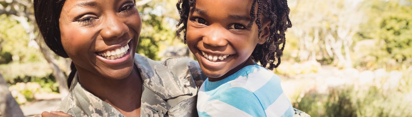 A military veteran and a young child representing tips for student veterans by Tulane School of Professional Advancement in New Orleans, LA
