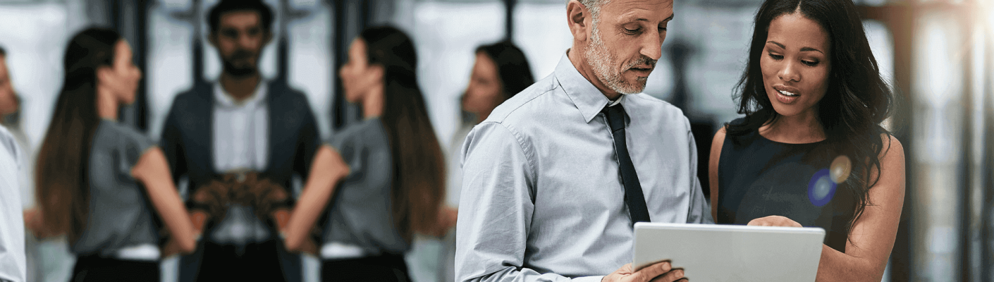 Groups of business people in an office environment