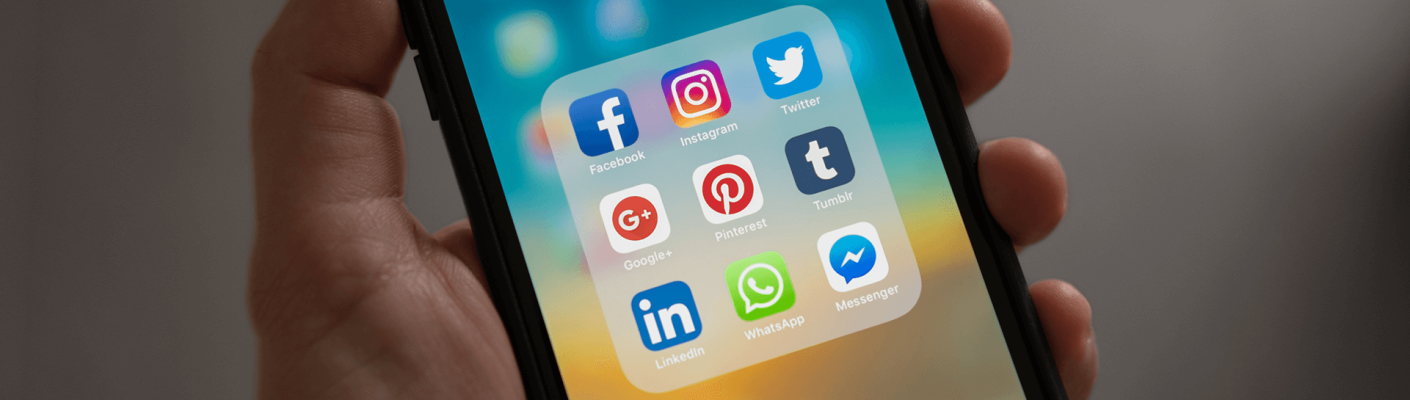 Social media apps displayed on a smartphone