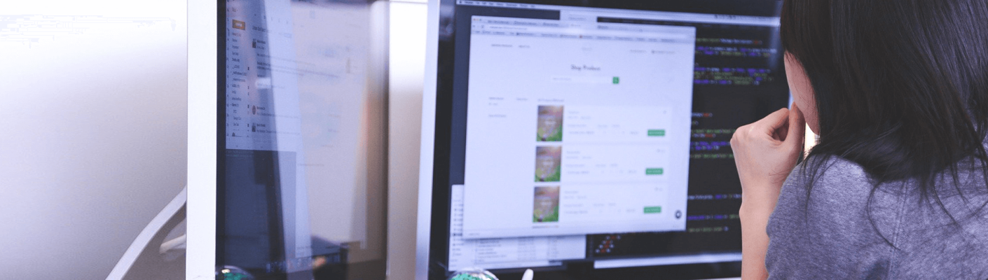 A marketing professional working on a computer
