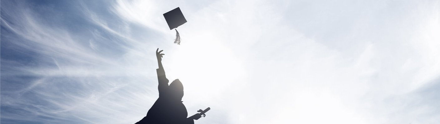 Graduate throwing cap