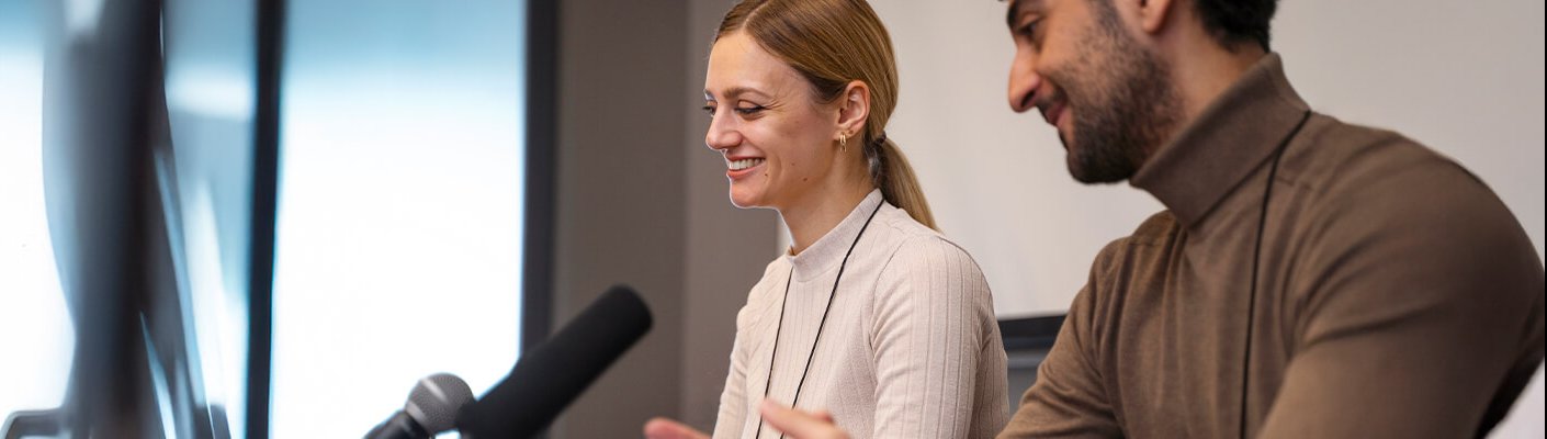 People talking at a podium