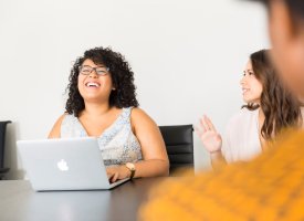 Humanities student in an office conference room - Tulane School of Professional Advancement