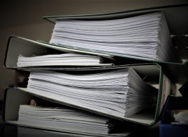 Stack of binders - Tulane School of Professional Advancement
