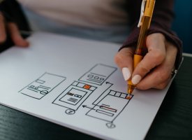 A person drawing a wireframe