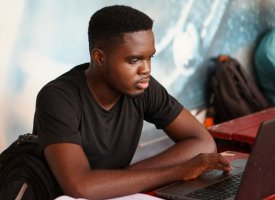 A student working on a laptop