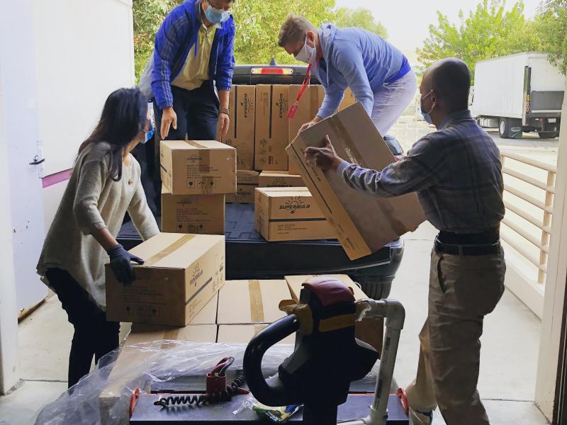 Nonprofit workers loading up a truck